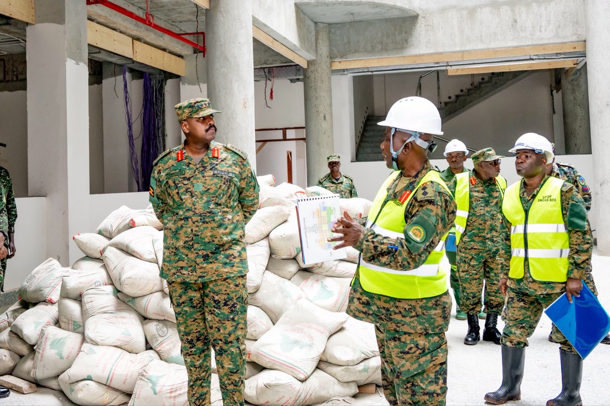 ChrisOMagezi's tweet photo. General Muhoozi Kainerugaba Commends UPDF Engineers as Defence and Military Headquarters Near Completion

Kampala, Monday September 14, 2026

The Chief of Defence Forces, Gen Muhoozi Kainerugaba, has commended the UPDF Engineering Brigade as construction of the new Ministry of Defence and Veteran Affairs (MoDVA)/UPDF complex reaches 87% completion, keeping the project firmly on track for commissioning in December.

Addressing engineers and construction personnel on Monday during a site visit at the military headquarters in Mbuya, Gen Kainerugaba praised their steadfast commitment to delivering the landmark complex.

Reassuring the workforce that their efforts would not go unrewarded, the CDF pledged special appreciation once the facility is handed over.

Constructed entirely by the UPDF Engineering Brigade, the project officially broke ground in August 2024.

The initiative was launched to resolve decades of fragmented office setups and provide Uganda’s armed forces with a consolidated command hub.

At earlier project milestones, Gen Kainerugaba highlighted that housing the defence ministry in a comfortable setting directly boosts operational efficiency and military coordination, noting that modern infrastructure remains essential for supporting contemporary defence strategies.

Designed as a twin-tower complex, the facility is equipped to streamline decision-making between the civilian ministry and operational military leadership.

The installation incorporates advanced communication hubs, high-tech command installations, and digital operational systems.

Site security has also been upgraded with a two-kilometre perimeter fence, modernised quarter guards, and dedicated alternative access routes.

Initially expected to take longer, the project gained rapid momentum following directives from the CDF to accelerate timelines while maintaining high-quality standards.

Upon its anticipated opening in December, the new headquarters will replace outdated administrative units on Mbuya Hill, establishing a unified base for the country’s military command.

During the site visit, the CDF was taken on a guided tour by lead engineers Col James Lwegaba, Joint Staff Engineering, Col Robert Chabo the Project Engineer and the site engineer, Captain Kikomeko Kigongo. The tour was also conducted in the presence of the UPDF Chief of Joint Staff, Lt Gen Jack Bakasumba; the Undersecretary at the Ministry of Defence and Veteran Affairs, Edith Butuuro; and other senior UPDF and MoDVA leaders.

Source: Defence Press Unit