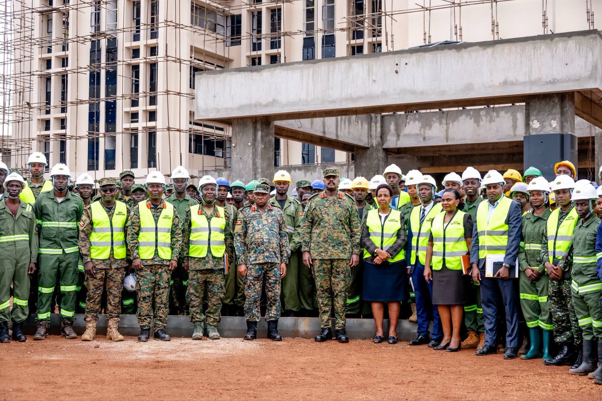 ChrisOMagezi's tweet photo. General Muhoozi Kainerugaba Commends UPDF Engineers as Defence and Military Headquarters Near Completion

Kampala, Monday September 14, 2026

The Chief of Defence Forces, Gen Muhoozi Kainerugaba, has commended the UPDF Engineering Brigade as construction of the new Ministry of Defence and Veteran Affairs (MoDVA)/UPDF complex reaches 87% completion, keeping the project firmly on track for commissioning in December.

Addressing engineers and construction personnel on Monday during a site visit at the military headquarters in Mbuya, Gen Kainerugaba praised their steadfast commitment to delivering the landmark complex.

Reassuring the workforce that their efforts would not go unrewarded, the CDF pledged special appreciation once the facility is handed over.

Constructed entirely by the UPDF Engineering Brigade, the project officially broke ground in August 2024.

The initiative was launched to resolve decades of fragmented office setups and provide Uganda’s armed forces with a consolidated command hub.

At earlier project milestones, Gen Kainerugaba highlighted that housing the defence ministry in a comfortable setting directly boosts operational efficiency and military coordination, noting that modern infrastructure remains essential for supporting contemporary defence strategies.

Designed as a twin-tower complex, the facility is equipped to streamline decision-making between the civilian ministry and operational military leadership.

The installation incorporates advanced communication hubs, high-tech command installations, and digital operational systems.

Site security has also been upgraded with a two-kilometre perimeter fence, modernised quarter guards, and dedicated alternative access routes.

Initially expected to take longer, the project gained rapid momentum following directives from the CDF to accelerate timelines while maintaining high-quality standards.

Upon its anticipated opening in December, the new headquarters will replace outdated administrative units on Mbuya Hill, establishing a unified base for the country’s military command.

During the site visit, the CDF was taken on a guided tour by lead engineers Col James Lwegaba, Joint Staff Engineering, Col Robert Chabo the Project Engineer and the site engineer, Captain Kikomeko Kigongo. The tour was also conducted in the presence of the UPDF Chief of Joint Staff, Lt Gen Jack Bakasumba; the Undersecretary at the Ministry of Defence and Veteran Affairs, Edith Butuuro; and other senior UPDF and MoDVA leaders.

Source: Defence Press Unit