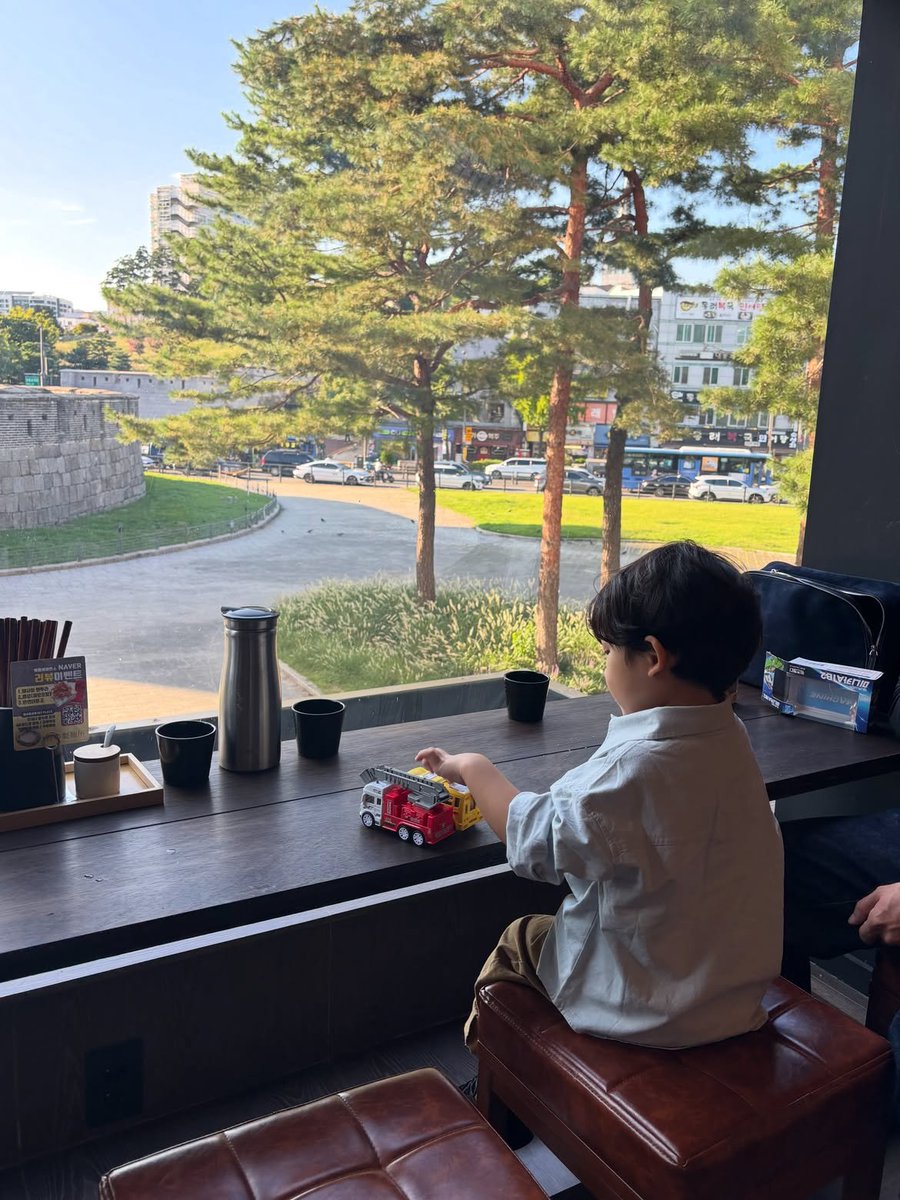 CallMeHiirokii's tweet photo. He said "what a beautiful view huh dada ?" while looking outside without knowing that the most beautiful view for me was him and his smile all along. Father &amp; Son date for once without mom because i stole him 😏💕 https://t.co/0iSkxINHCf