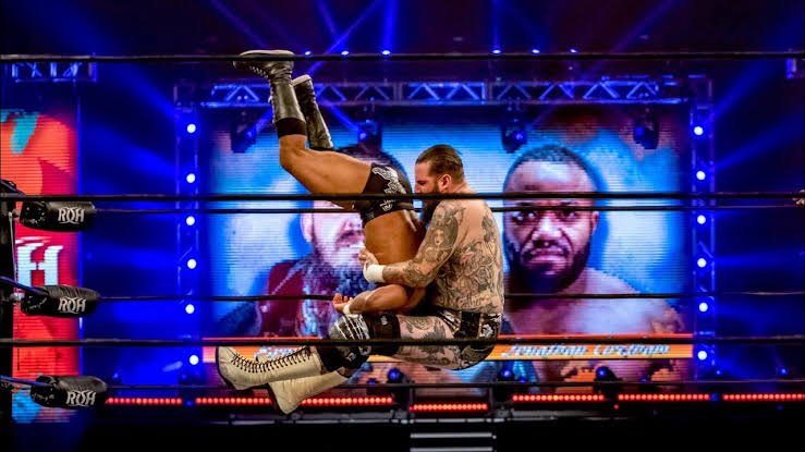 WSWFederation's tweet photo. A fleet of officials sprints down the ramp, but Vale casually swats them away like pathetic insects, his eyes completely devoid of human emotion. He drags Cage's limp, battered body up from the canvas by the neck. Vale hooks the champion, hoists his dead weight into the air, and spikes him straight to hell with a devastating, neck-snapping Gonzo Bomb!