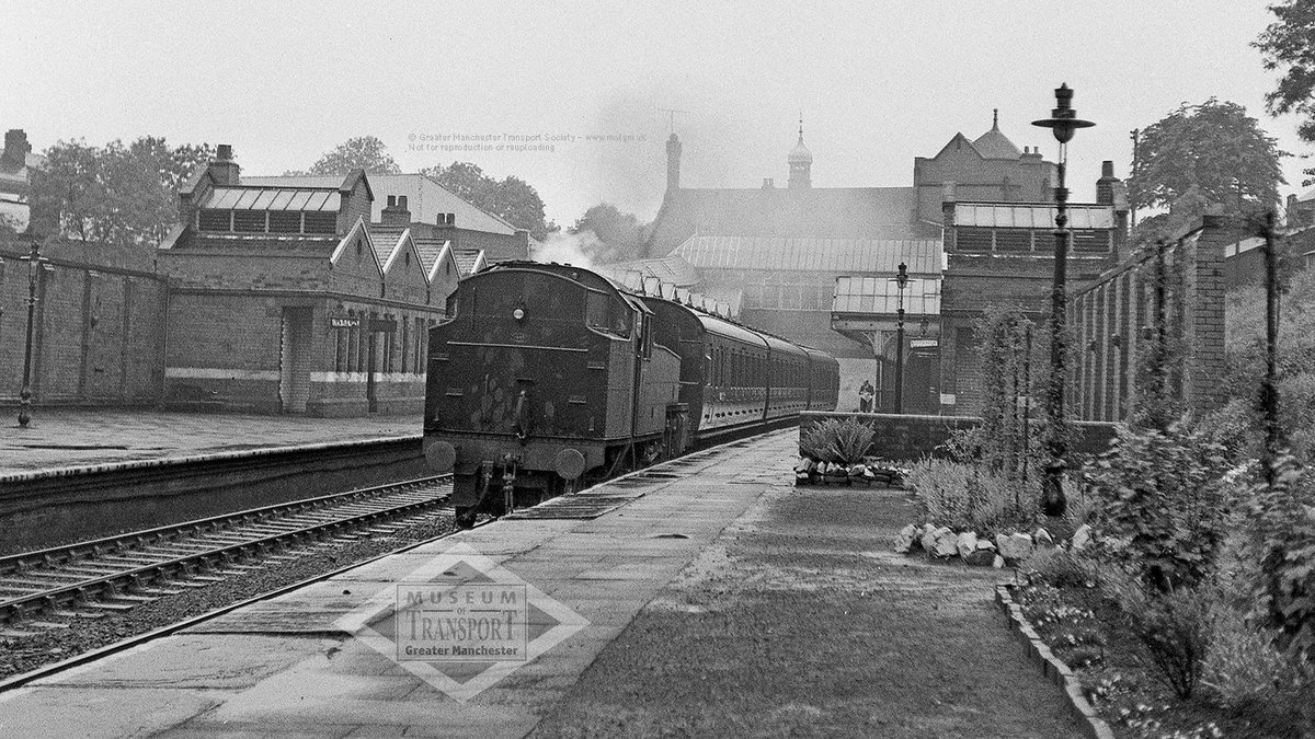 MoTGM's tweet photo. Let's have a rail-themed #MysteryMonday for a change. We see a station with well-kept platforms and even a garden - but where was it? Tell us if you think you know and we'll confirm the answer later. https://t.co/z5e5arm0e8
