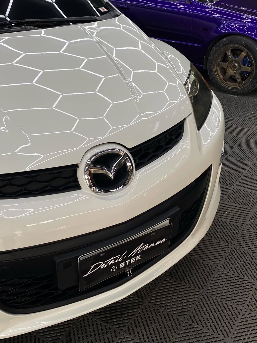 MaynardPorb91p's tweet photo. A little transformation goes a long way. This Mazda MX-7 received a complete exterior refresh, from body-colored mirrors and side skirts to blacked-out trim and calipers, plus corrosion protection and a full detail. https://t.co/BnsdIsmbcQ