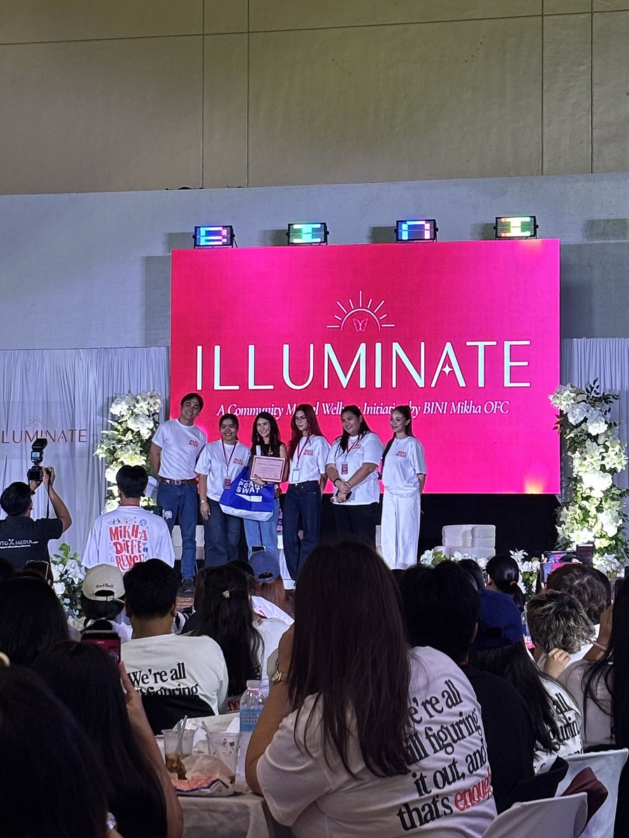 i43bini_'s tweet photo. Was so sure I couldn't attend today because I had an exam scheduled. But it suddenly got cancelled due to the transport strike, so I took it as a sign to secure a slot last night (buti meron pa at na-clutch !). I'm really glad I made it huhu. Life has been so overwhelming lately, and this was exactly the reset I needed. Last year was so memorable that I really wanted to experience it again, and returning to this community felt like a warm hug. Will definitely make this a yearly thing now.

As the shirt says:
"We're all still figuring it out, and that's enough." ❤️
And as Kuya Kim reminded us:
"A little kindness can make a difference."

My heart is full—thank you so much for organizing this meaningful event @bini_mikha and @BiniMikhaOFC 🥹🫶. Grateful for the safe space and the amazing speakers as well! ✨

#ILLUMINATE #Illuminate2026 @mikhadifference