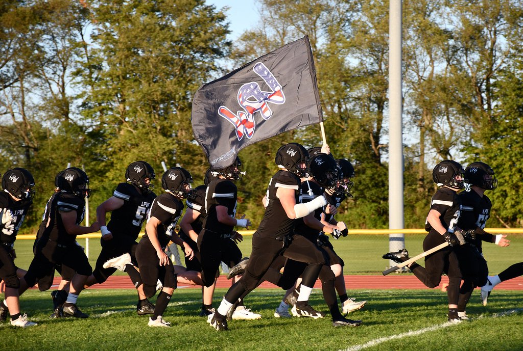PerryCSD1's tweet photo. LPW football opened the season on Friday with a loss to Alexander/Pembroke, but it was a night of remembrance and gratitude as the teams marked the 25th anniversary of the September 11 attacks and honored all first responders in attendance. https://t.co/vEufRU2NxC