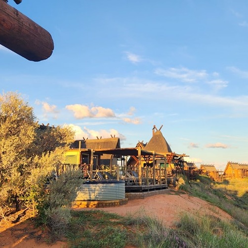 MargBeedletqv's tweet photo. Kgalagadi remains a standout from last year’s travels. At! Xaus Lodge, quiet desert beauty, community heritage, Fair Trade impact and unforgettable dark skies make every sunset feel magical. Red dunes or star-filled skies? https://t.co/8vios3pNXr