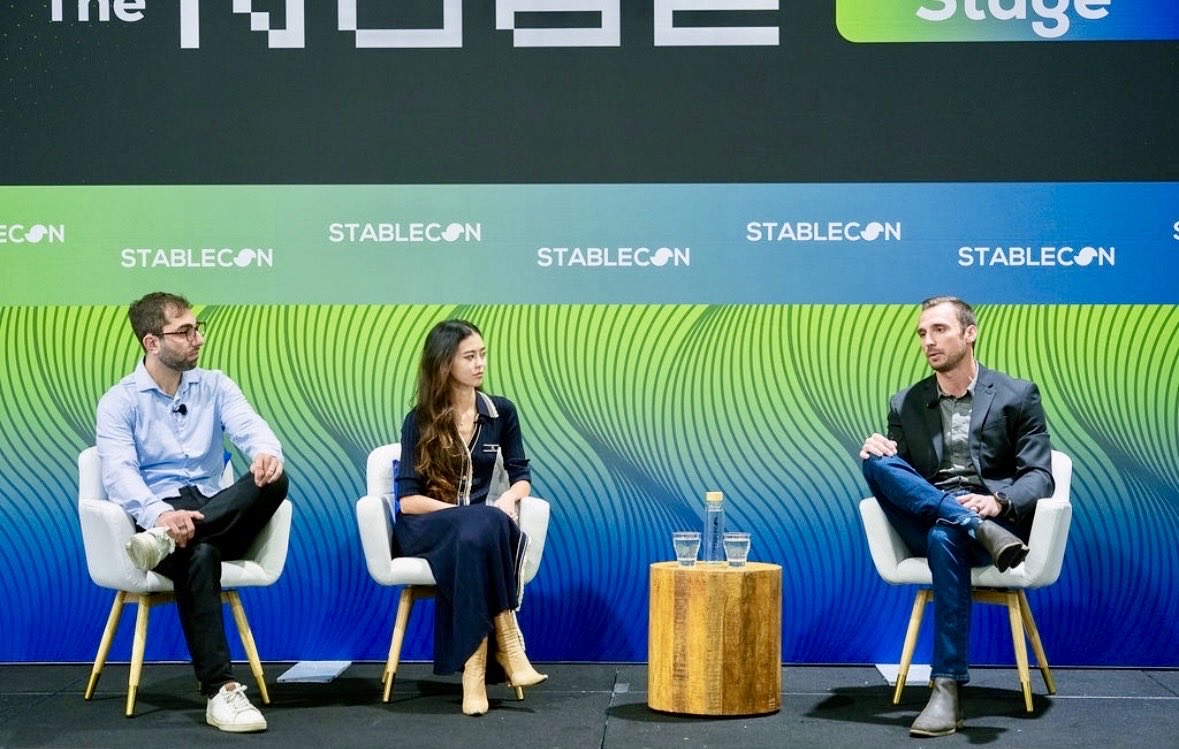 elle_leemay's tweet photo. And that’s a wrap on Stablecon 2026! Quick thoughts.

Interestingly not a big presence from the actual stablecoin issuers - don’t recall folks from Circle, Paxos, Tether etc. having booths or many people on the ground…

Conference was actually the perfect size. Not many VCs but a lot of Series A-D startups.

Still most stablecoin volume is from trading rather than payments.

The recurring Coinflow question from VCs and founders was “wait you have actual volume (we power tens of $ Billions in annualized payment volume on stablecoin rails - real commerce volume) how did you do that?” The answer is we met users where they are and not force them onboard onto crypto rails. The thesis was to bridge traditional financial rails that ppl already utilize, but leverage stables on the backend. For the vast majority of our users we obfuscate the stablecoin side. So they come with their traditional payment methods and bank accounts, but benefit from Stablecoin tech with instant settlement and programmability etc.

The biggest topic at Stablecon was compliance and regulatory. We were in DC. Big presence from @SocureID, @withpersona, @sumsub etc. Portable identity was one of the hottest topics. Incredible in theory but practically still very early.

Lastly, the TLDR on my panel: What connecting to traditional rails means for @CoinflowLabs is that we are compliance-first and adhere to the regulatory frameworks of the card networks and banks. We partner with teams like @withpersona to help us with portable identity, so that KYC and KYB can be as close to as interoperable, global and instant as stablecoins. Lots of good progress on that front. Finally thank you to my fellow @thestablecon panelists @bettermoney_co @withpersona - had a blast!