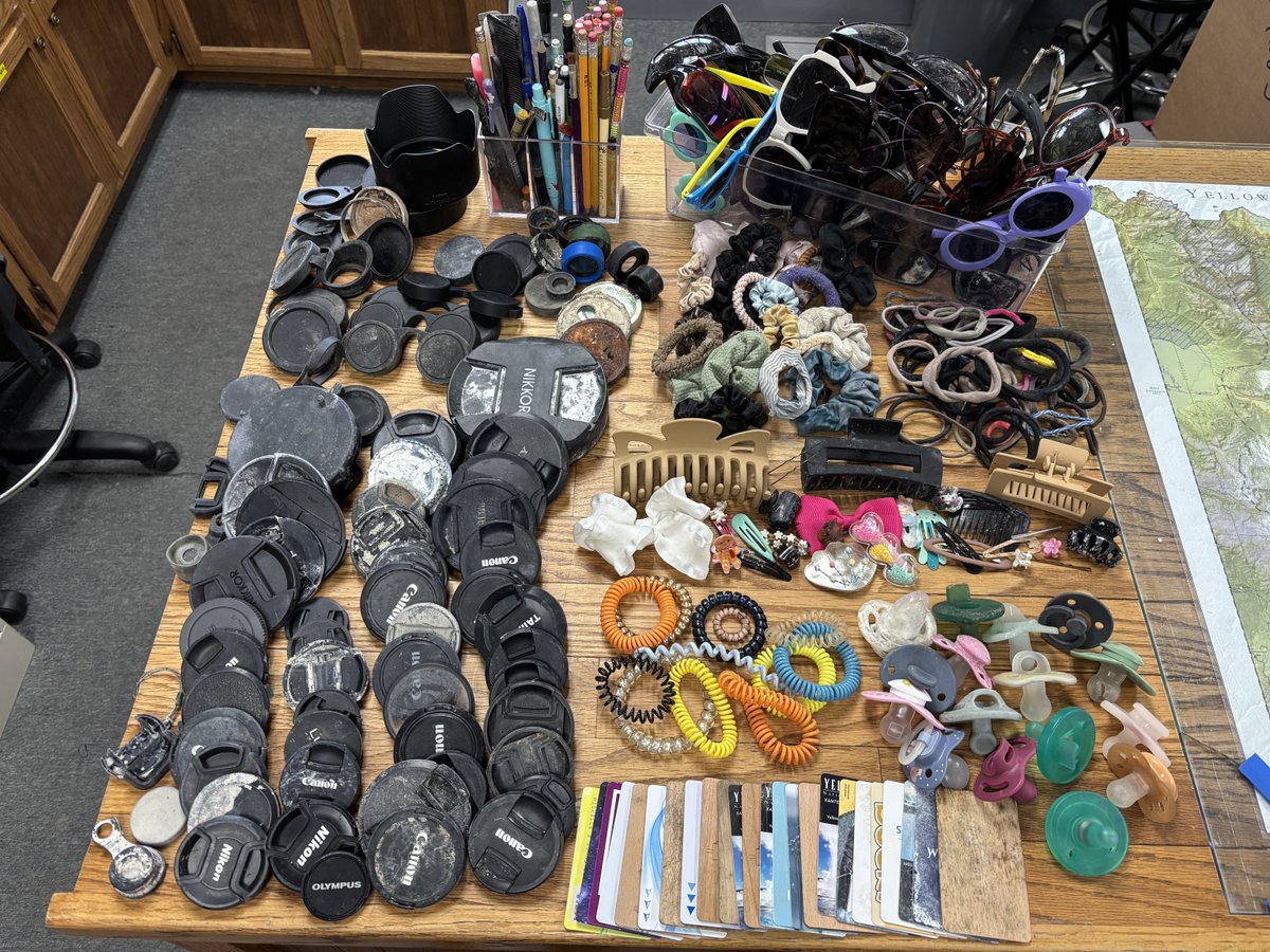USGSVolcanoes's tweet photo. Hold onto your hats and sunglasses—and your trash! Today's Yellowstone Caldera Chronicles details the items that Yellowstone National Park’s Geology team has collected so far this season from the park’s hydrothermal areas. There are some pretty interesting finds...

https://t.co/qDj3CdVK8z

📷1: Hats collected by the Yellowstone National Park Geology Team and other park staff from hydrothermal areas during the summer 2026 season (Geology Team truck for scale).

📷2: Coins, bills, and jewelry collected by the Yellowstone National Park Geology Team from hydrothermal areas during the summer season in 2026.

📷3: Frequent finds collected by the Yellowstone National Park Geology Team from hydrothermal areas during the summer season in 2026: camera lens covers and binocular parts, pens and pencils, sunglasses, hair accessories, hotel keys, and more!

📷4: More bizarre Yellowstone National Park Geology Team finds from hydrothermal areas during the 2026 summer season—including golf tees, fortune cookie fortunes, AirPods, rubber ducks, and Invisalign retainers!

All photos by Margery Price, Yellowstone National Park, September 2026.