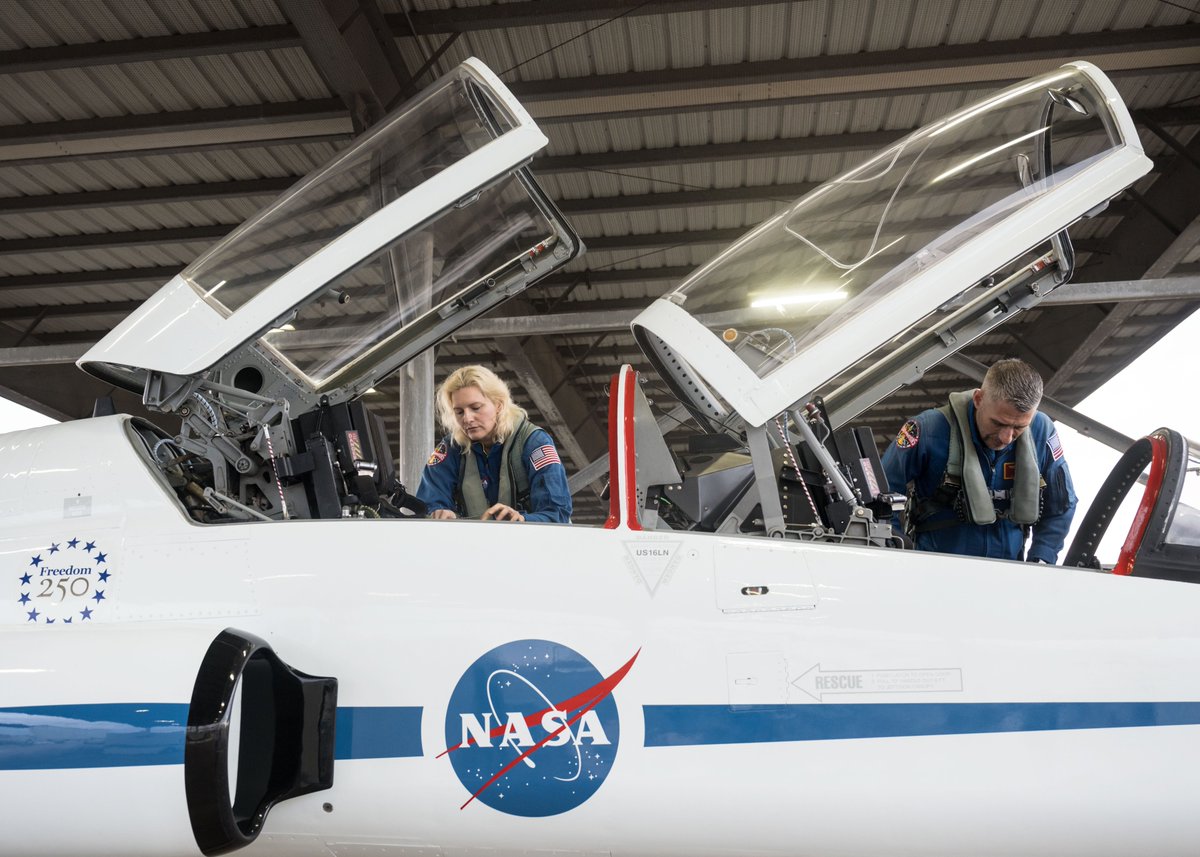 NASA astronauts Luke Delaney and Deniz Burnham inspect their T-38 aircraft ahead of a training flight. Photo: NASA/Luna Posadas Nava