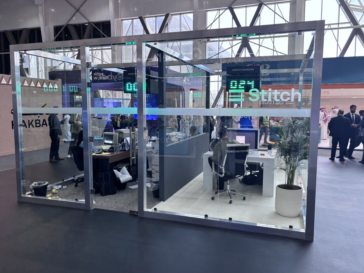 StitchHQ's tweet photo. Two eras of banking in one glass box. Legacy vs. AI-native banking side by side at @money2020_me. https://t.co/TJwVeORNKJ