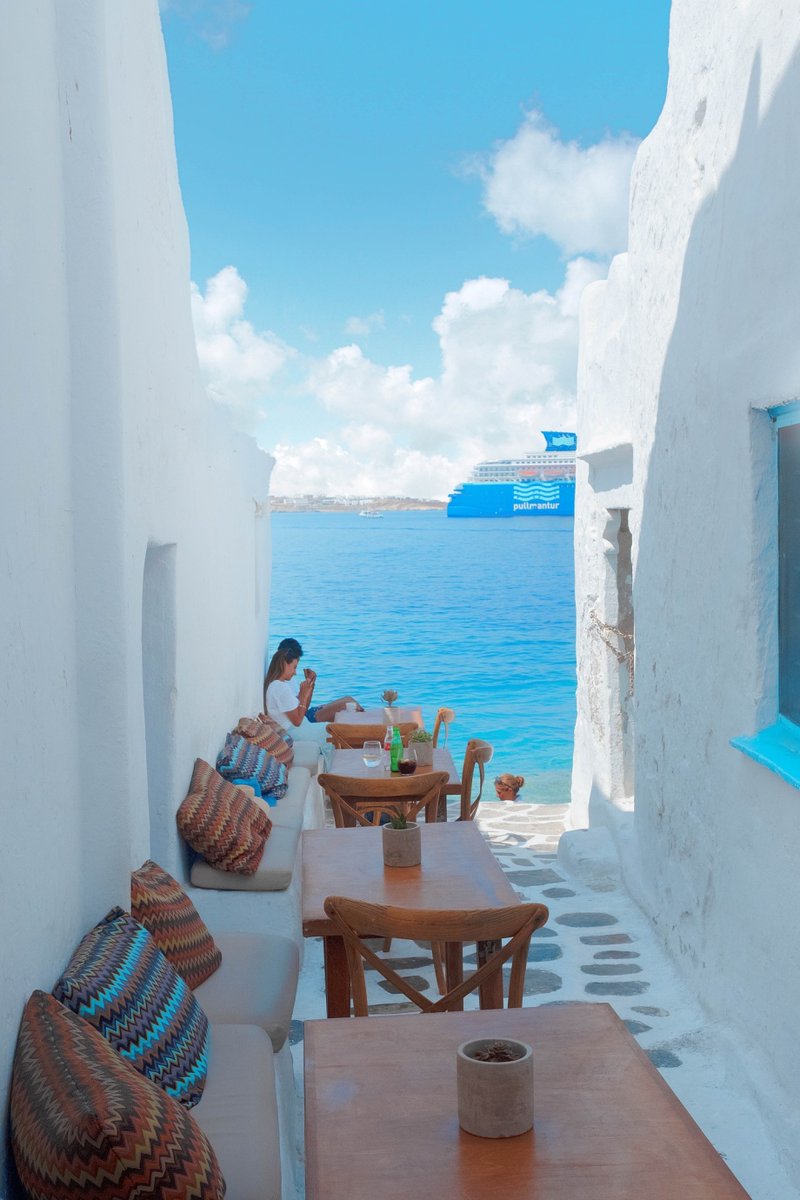 RevoDoFEx's tweet photo. Just stumbled on a tiny coastal café in Santorini—sun-kissed pastries, sea breeze in my hair, and zero crowds. Perfect slow Sunday vibes, no filter needed. #TravelBliss https://t.co/pooobrWBLl