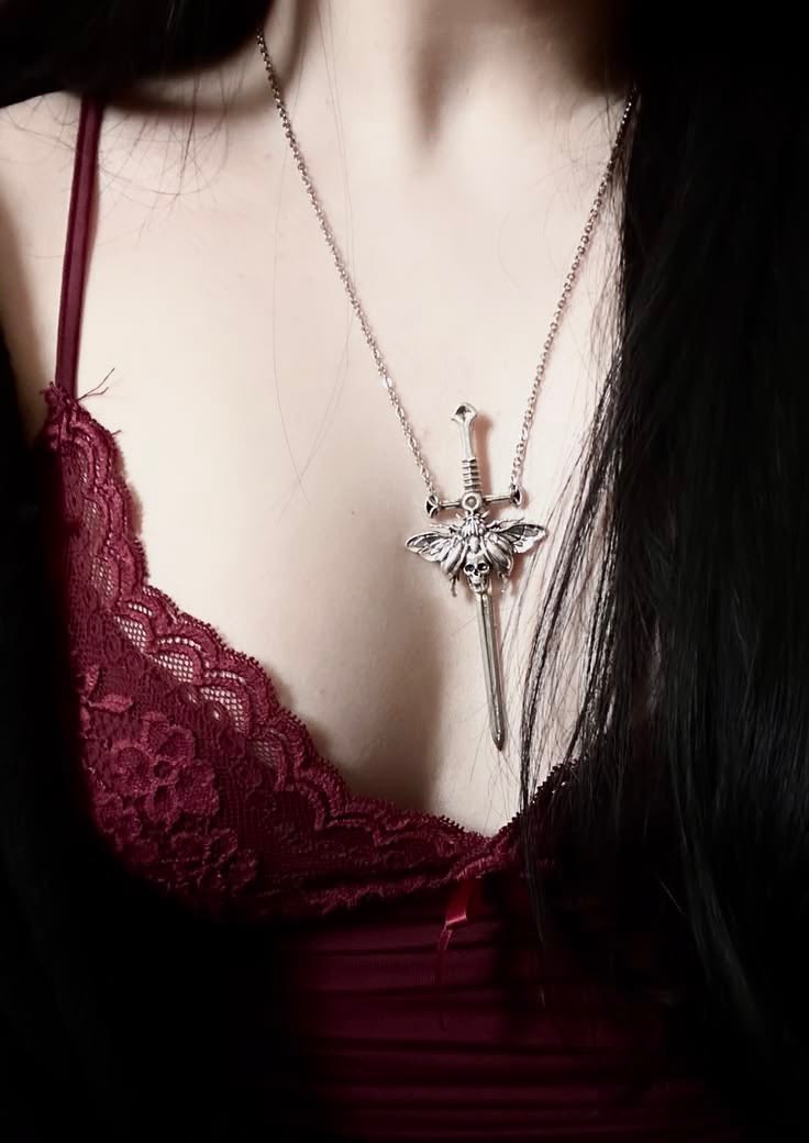 gothicornate_'s tweet photo. dark romance written in silver and red https://t.co/AsiKzH7xau