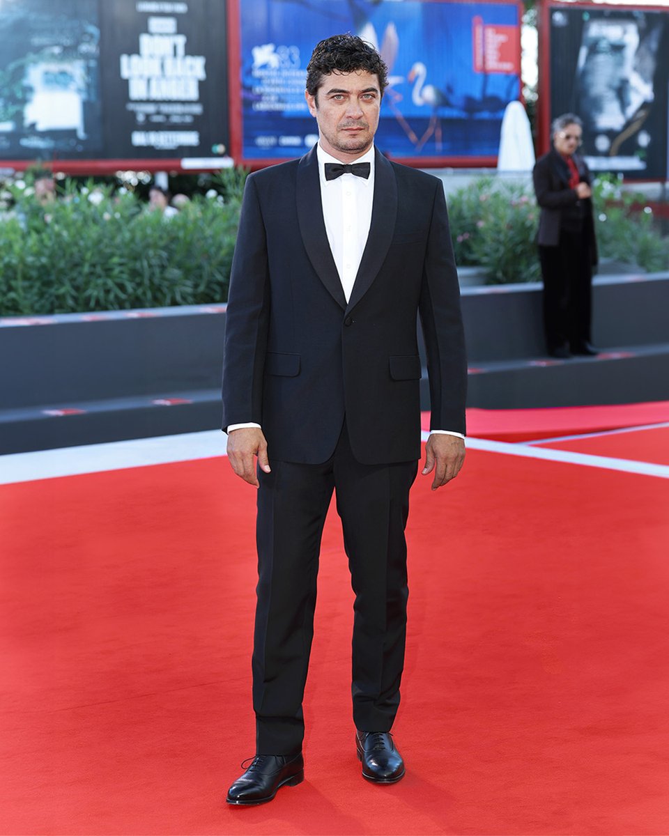 Prada's tweet photo. Riccardo Scamarcio, Daniel Blumberg, and Andrea Pallaoro wore #Prada while attending the 83rd Venice International Film Festival.

#RiccardoScamarcio, winner of the Orizzonti Best Actor Award for "I Figli Della Scimmia", wore a black single-breasted mohair wool tuxedo, a white popeline shirt and a black satin bow tie while attending the Closing Ceremony.

#DanielBlumberg wore a black double-breasted wool suit, a black popeline shirt and black brushed leather shoes, while attending the Closing Ceremony.

#AndreaPallaoro wore a single-breasted wool and mohair tuxedo, white popeline shirt and patent leather black shoes, while attending the "The Echo Chamber" screening.

#PradaPeople #VeniceFilmFestival