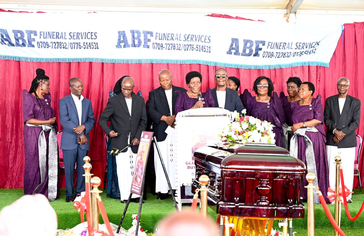 millybabalanda's tweet photo. Today, I joined mourners in Busabala to pay our last respects to the late, Maama Gladys Nabbosa Jingo, the beloved mother of the former Mayor of Entebbe Municipality, Hon. Stephen Kabuye.

I conveyed deepest sympathies and heartfelt condolences from His Excellency President Yoweri Kaguta Museveni, the First Lady and Minister of Education and Sports, Maama Janet Kataaha Museveni, the Permanent Secretary of the Office of the President, Hajji Yunus Kakande, and the entire staff of the Office of the President to the bereaved family.

I also, on my own behalf and on behalf of the SDA Busoga Field, expressed sincere condolences to the family, friends, and the entire SDA fraternity for this great loss.

Maama Gladys was a devout SDA church member whose faith, service, and maternal guidance touched many lives.

I cautioned mourners to pay keen attention to their health, to visit hospitals regularly for medical check-ups, and to take deliberate steps to safeguard their lives against preventable diseases.

During the funeral service, I also took the opportunity to sensitise mourners about government wealth-creation programmes aimed at improving household incomes.I encouraged families to embrace initiatives such as the Parish Development Model (PDM), Emyooga, Operation Wealth Creation (OWC), and the Four-Acre Model farming concept as sustainable pathways out of poverty.

We thank God for the gift of life she lived, may the Almighty comfort the family during this difficult time.

"The Lord is close to the brokenhearted and saves those who are crushed in spirit." – Psalms 34:18

May Maama Gladys Nabbosa Jingo's soul rest in eternal peace.

For God and my country!