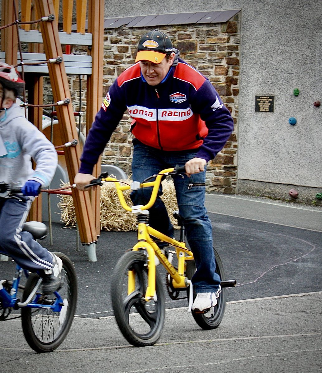 CocksyIOM's tweet photo. John McGuinness, Laxey primary school “TT” 2013.  My daughter was in the race, she still talks about it today, John signed her bike afterwards, she was made up (not as much as me though!) Top man and great sport 🤩 https://t.co/HSd7EwWoar