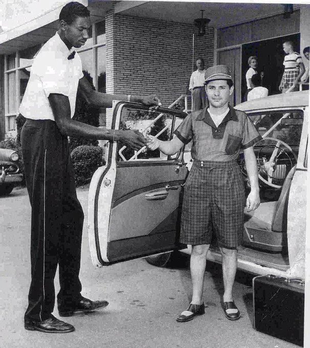 Jimfrombaseball's tweet photo. "I thought I was pretty hot stuff."
Wilt Chamberlain.
In 1954 before his senior year of high school, Wilt Chamberlain worked as a bellhop at "Kutsher’s Country Club", a Jewish resort in the Catskill Mountains.
By day he was making $2 an hour, getting  great tips from the awestruck guests as he lifted their luggage through a second floor window while standing outside on the ground.
At night Wilt played on the Kutsher’s basketball team, coached hard by the resort’s, "Athletic Director", Red Auerbach.