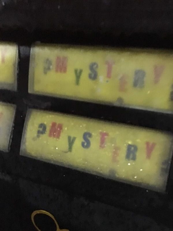 internetpreai's tweet photo. the capitol hill seattle mystery vending machine

the vending machine, with all buttons labelled "mystery", often served random discontinued drinks. it is unknown who was responsible for restocking the machine, leading to the development of a local legend that it was haunted.

the machine was located on east john street in seattle. it was a branded coca cola machine but dispensed drinks from many different manufacturers. The drinks dispensed were typically unusual flavours that were no longer being manufactured. 

in 2012, a short film was produced taking inspiration from the mystery of the machine.

on 29 June 2018, the machine disappeared following work done on the nearby bus stop and sidewalk, with a note left nearby reading "went for a walk"