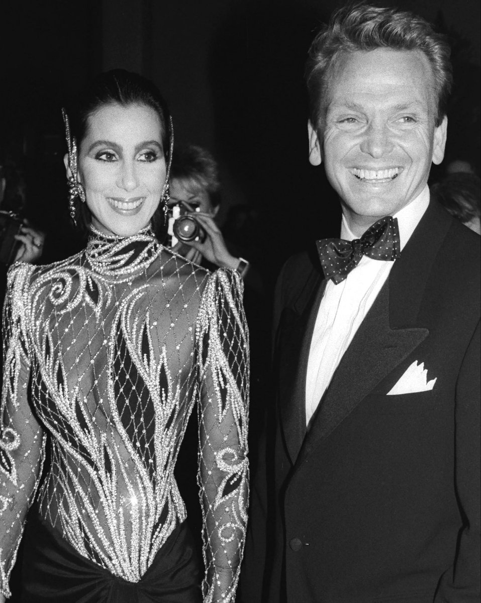 PopBase's tweet photo. Cher pays tribute to her friend and decades-long collaborator, Bob Mackie:

“My dear Bob has gone up to heaven.Knowing him,he’s bringing Sequins,Beads,&amp; his sketch pad.
Good nite sweet Prince
Luv 
Me
         Dyslexic” https://t.co/C3Zzyg8wWD