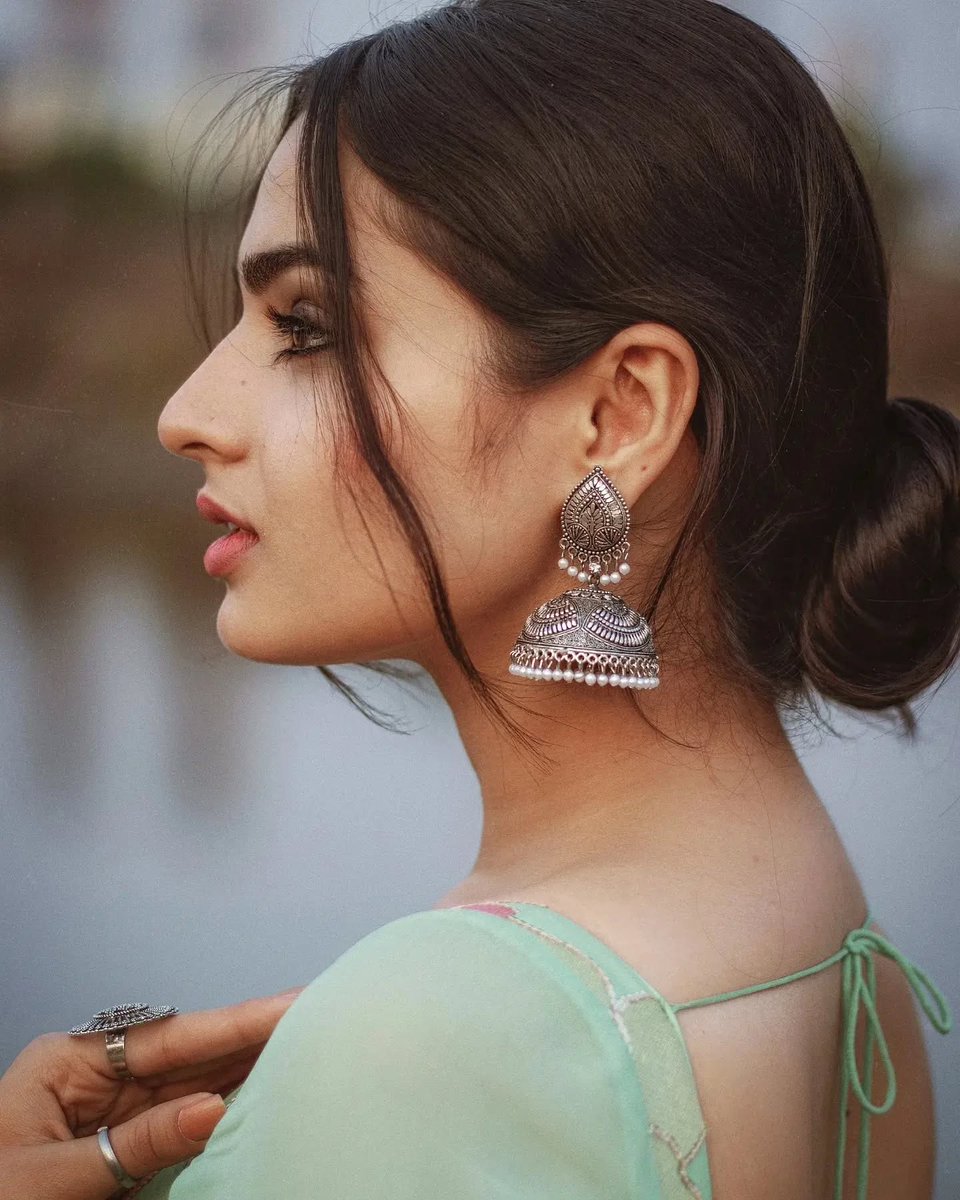 BispoB's tweet photo. Mint tones, floral details, and a gaze that owns the frame. Soft, graceful, and striking in every detail. Featured: Ayesha Khan. What stands out more: the mint look or those statement jhumkas? https://t.co/Lg0I4LDvhJ