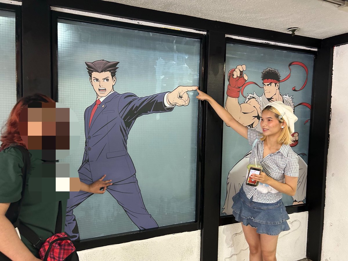 spitfireheist's tweet photo. saw my man outside of the capcom store while they were setting stuff up ahaha except my lesbian boyfriend was there visiting from out of town so we became a throuple #aceattorney https://t.co/XnjuKcEu2W