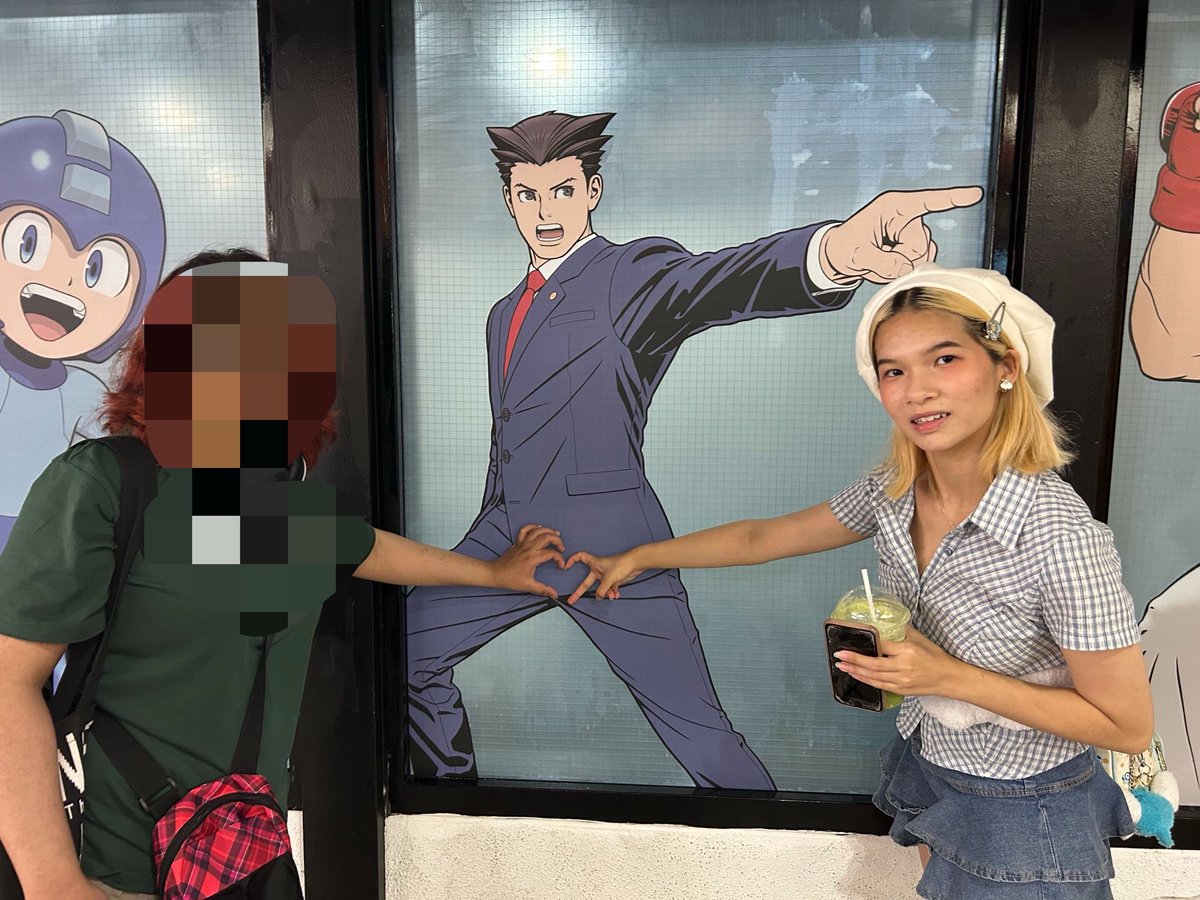 spitfireheist's tweet photo. saw my man outside of the capcom store while they were setting stuff up ahaha except my lesbian boyfriend was there visiting from out of town so we became a throuple #aceattorney https://t.co/XnjuKcEu2W