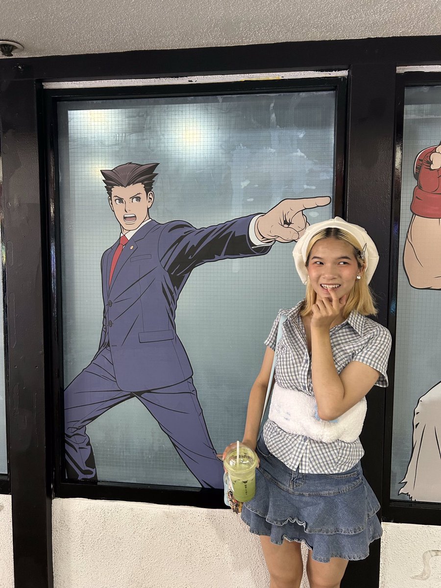 spitfireheist's tweet photo. saw my man outside of the capcom store while they were setting stuff up ahaha except my lesbian boyfriend was there visiting from out of town so we became a throuple #aceattorney https://t.co/XnjuKcEu2W