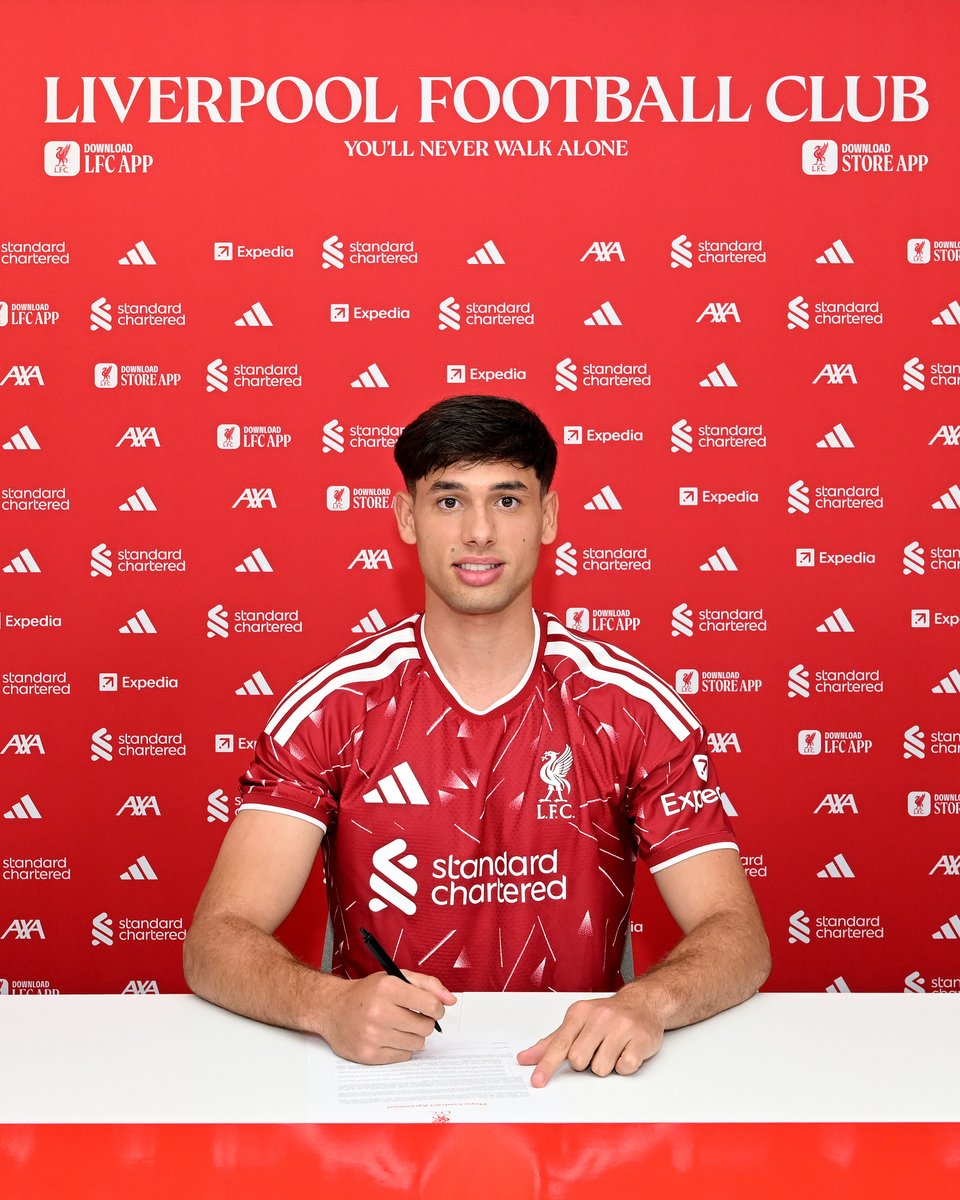 Photography of Patrik Farkas as he signs a professional contract to join Liverpool FC.