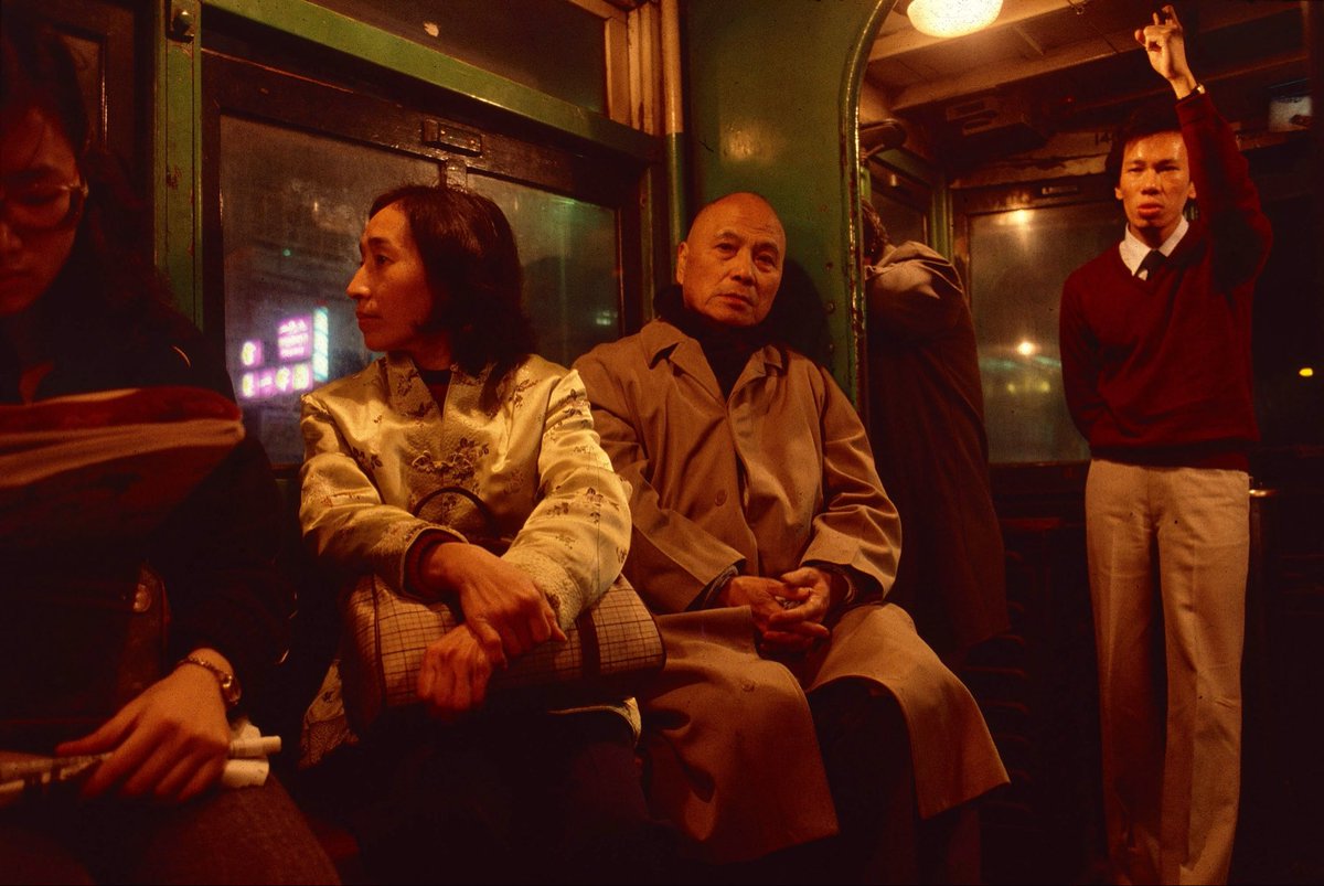 gregforaday's tweet photo. Hong Kong scenes, 1983-1985.

From “HK:PM. Hong Kong Night Life 1974-1989” (plus an out-take or two).

Books available via link in bio. Signed on request. Shipping worldwide.

https://t.co/fcCHtVXXRf

1. Evening tram, 1983.
2. Temple Street and hotel window. 1985/1983.
3. HK police post on HK-China border. Mainland couple detained when trying to cross into HK illegally. 1985. A nightly routine on the border during the mid 1980s.
4. Cantonese Opera, Peng Chau. 1983.
