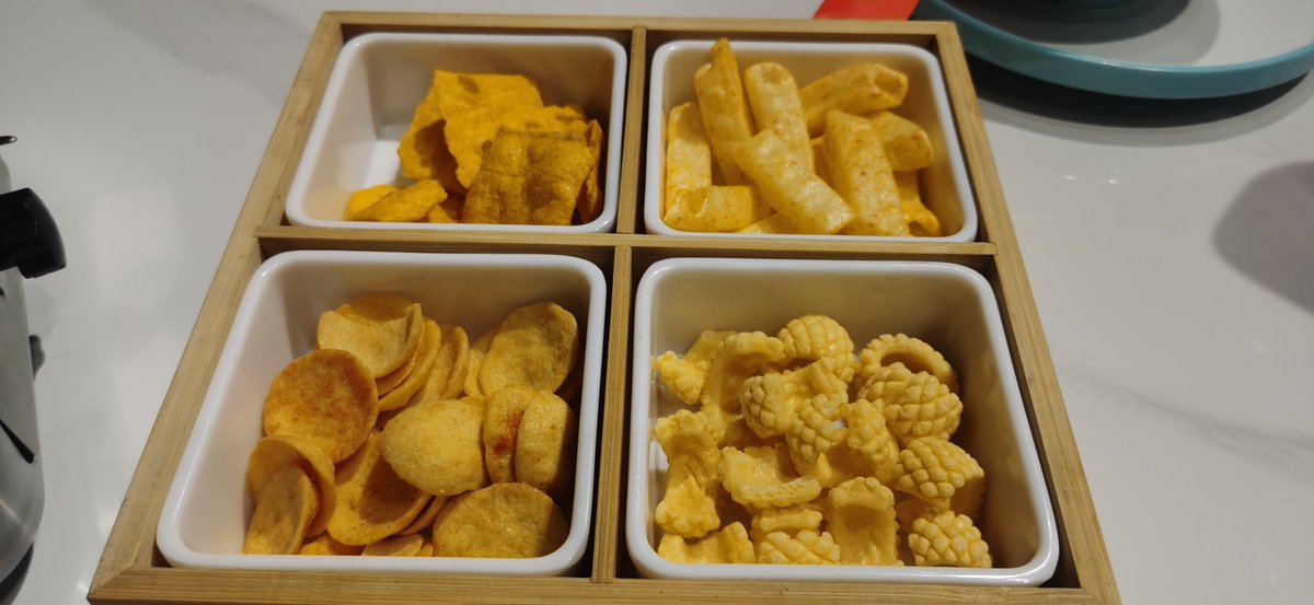 RorySalierno's tweet photo. Just shared a bag of crispy salted egg yolk potato chips with my desk mate—snack vibes hit different when you split the good stuff! https://t.co/SIYXaAsqGt
