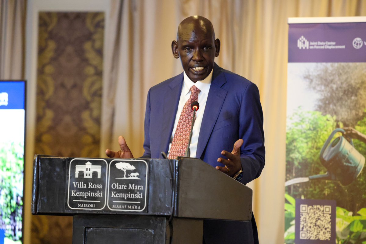 C_ServicesKE's tweet photo. Principal Secretary Dr. Belio Kipsang officially opened the Regional Dialogue on Evidence to Inform Refugee and Host Community Inclusion and Self-Reliance in East Africa, held in Nairobi.

The dialogue brings together governments, development partners, researchers and other stakeholders to explore how credible evidence can inform policies and practical interventions that promote refugee inclusion, self-reliance and stronger host communities.

Dr. Kipsang highlighted Kenya’s transition from a predominantly humanitarian approach to an integrated development model through the Shirika Plan, which seeks to progressively integrate refugee services into national and county systems while expanding economic opportunities for refugees and host communities.

The dialogue was convened by the World Bank, UNHCR and the Joint Data Center on Forced Displacement.