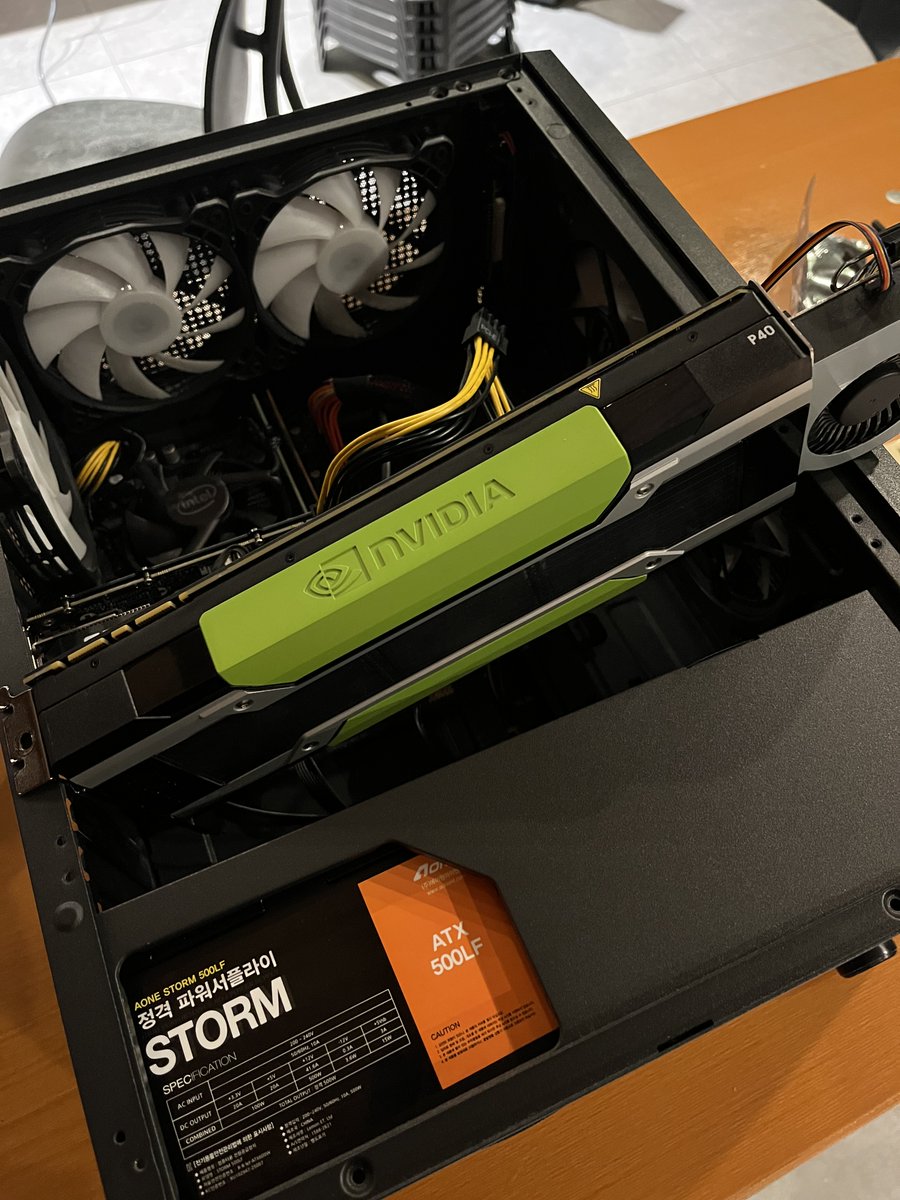 dextune's tweet photo. I happily picked up two used Nvidia Tesla P40 GPUs.

I knew the P40 was old and ridiculously overbuilt.

What I did not expect was how long the GPUs would become once the coolers were attached.

Tried putting them in the case.

Nope.

The cooler end would not fit.

I thought about it for about 10 seconds.

Turns out the bottleneck was not the human.

It was the case.

So I grabbed a hammer and pliers and destroyed the front section of the case.

After that both P40 GPUs fit perfectly.

Put the cover back on and you cannot even tell from the outside.

Apparently hardware fits if you hit it hard enough.

Good experience.