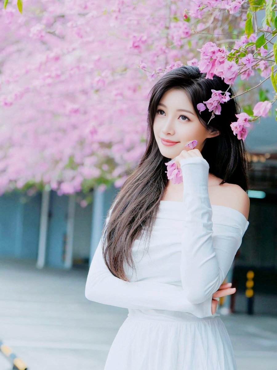 jucud's tweet photo. [Just felt like standing under the cherry blossom shower for 5 mins—today’s small win: breathing in softness when everything feels loud.]， https://t.co/4Nuis0FiHN