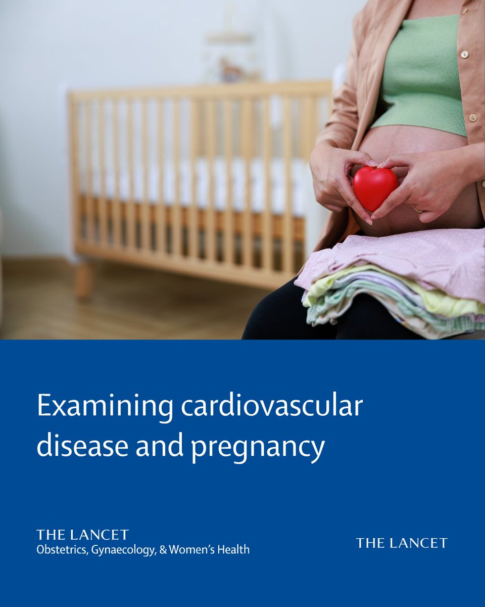 Midsection close-up of an expectant mother holding a red heart against her bare pregnant belly, sitting with folded baby clothes on her lap and a wooden crib in the blurred background. Credit: Rhenizara S/Getty Images. Overlay text: \"Examining cardiovascular disease and pregnancy\".