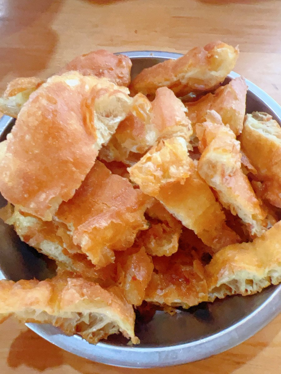 GabrielaFrgtx's tweet photo. Crunchy Chinese fried dough sticks (youtiao) at the street stall! Hot, fluffy, perfect with soy milk for a quick morning bite.  #StreetFoodChaos https://t.co/p9Vhv3PhxM