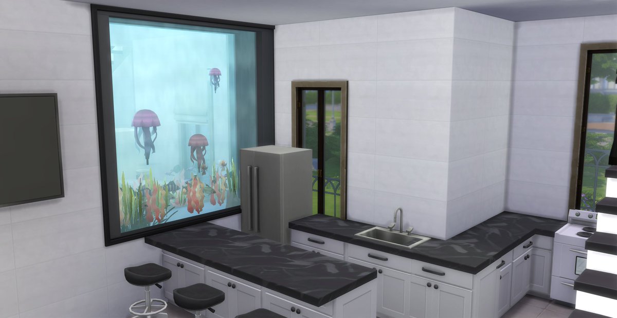 Soffsims's tweet photo. This has to be one of my favourites! Residential rental separated by a functioning aquarium 🪼
#sims4 #sims4build #basegame #sims https://t.co/q7D2RGbYDv
