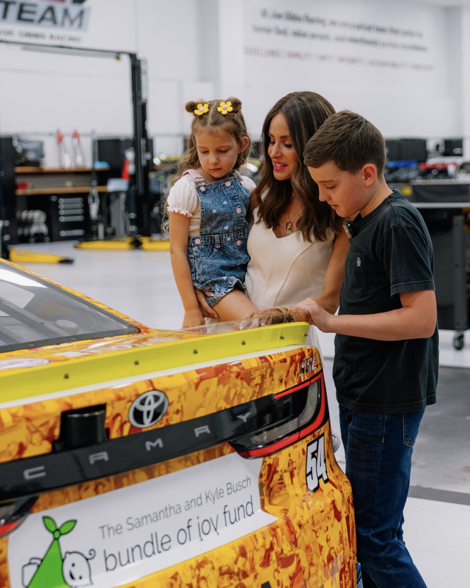 JoeGibbsRacing's tweet photo. As we prepare to head to Bristol for a special weekend honoring Kyle Busch, we wanted to give those closest to him the first opportunity to see the M&M’S tribute car up close. The scheme contains a mosaic of photos that capture Kyle’s life as husband, father, championship-winning NASCAR driver, and friend.