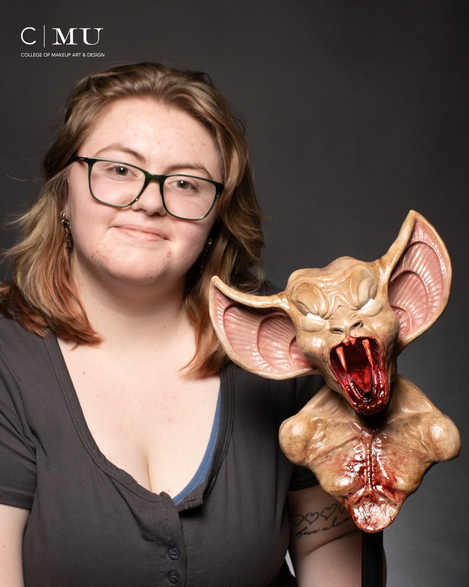 zeko960's tweet photo. A cinematic creature design with oversized bat-like ears, sculpted features, glossy skin, sharp fangs, and realistic blood effects. Crafted by CMU student Tessa Williams. https://t.co/bXth4dIEEv