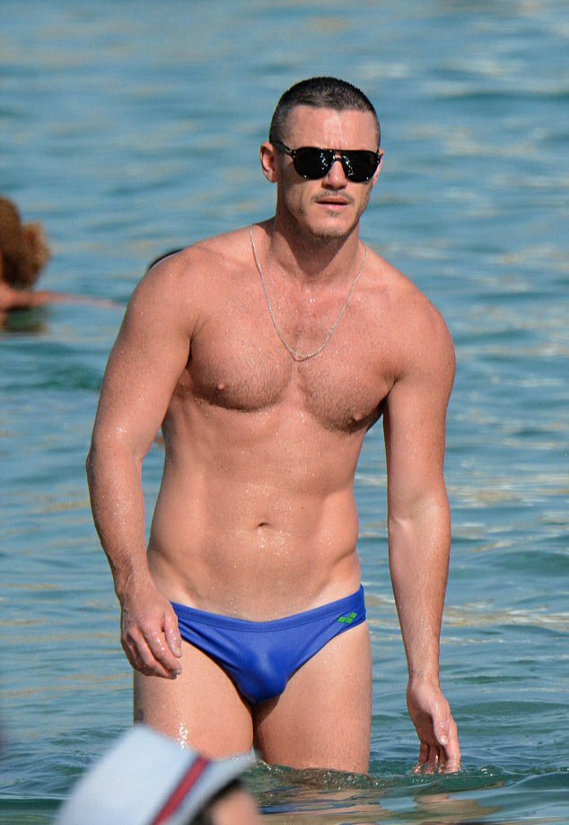 sinfulfire's tweet photo. luke evans little blue speedo lives rent free in my mind...omg he was so hot for doing this 🤤 https://t.co/8xEymeE9c0