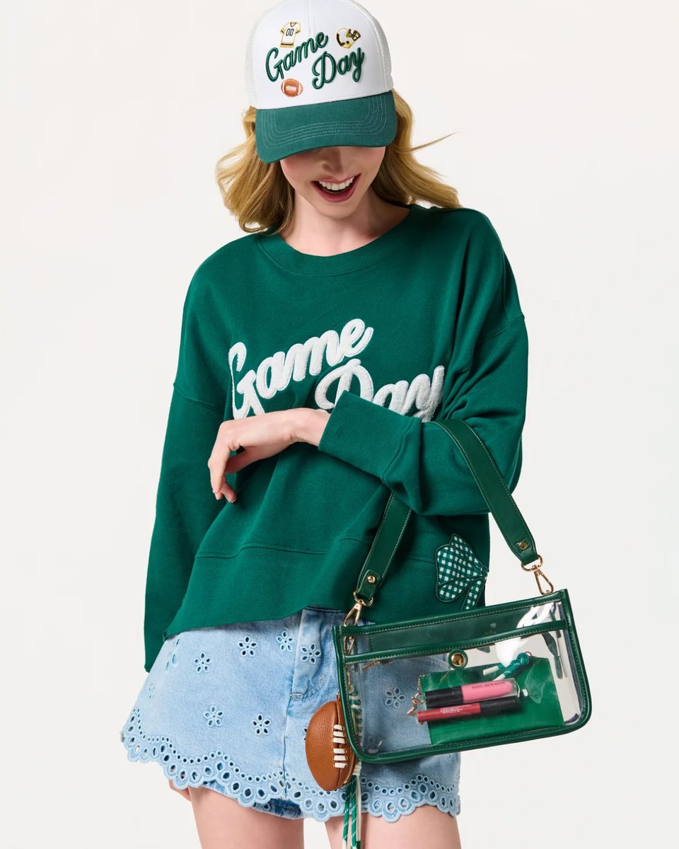 Shiraleah's tweet photo. Game day, but make it a whole look. 🏈💚 From spirited layers to stadium-ready accessories, consider your outfit officially in the starting lineup: https://t.co/eYP6Z8GXps https://t.co/MTXaYOxzAv