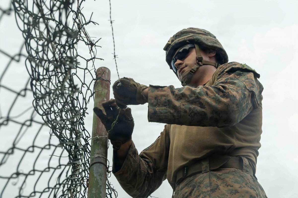 A U.S. Marine with Combat Logistics Battalion 8, Littoral Combat Force-24, sets up barbwire to reinforce their security posture, Aug. 3, 2026. U.S. Military forces are deployed to the Southern Command area of responsibility in support of Department of War-directed operations, and the President\u2019s priorities. (U.S. Marine Corps photo)\n\n