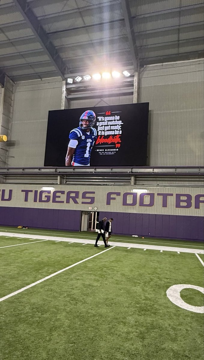 TigahLovin's tweet photo. LSU Football Indoor with Deuce Alexander’s message up on the big screen. https://t.co/pb1Wag7Ezz