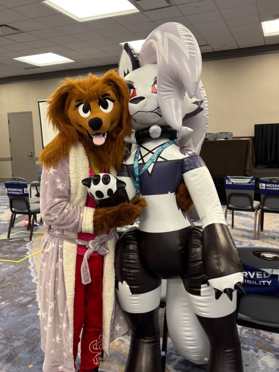 BreeGingersnap's tweet photo. The famous Loona made an appearance at #fm2026 and I couldn't resist giving her a tight hug despite her attitude. 🤣 Silly Nami in the background probably got a little jealous. https://t.co/mrz9IoG0rD