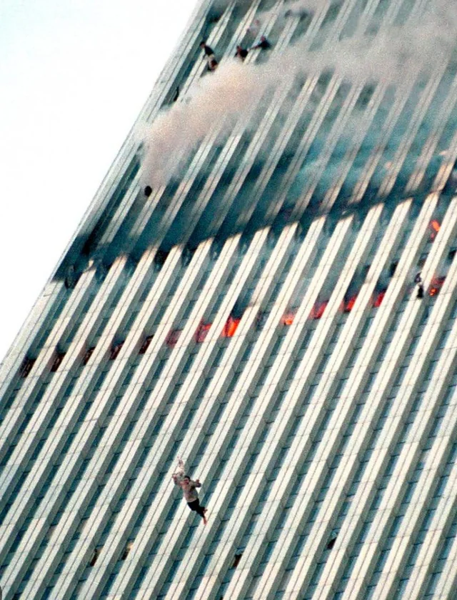 EchoesofWarYT's tweet photo. Around 200 people fell from the World Trade Center on September 11th. Not one of them is recorded as a suicide.

That is not sentiment. That is the official finding of the Office of the Chief Medical Examiner of the City of New York, and it is written on the death certificates.

All 2,753 deaths at the World Trade Center were ruled homicides. Every single one. The people who went out the windows are counted in that number exactly the same as the people who were killed on impact, the people crushed in the collapse, and the firefighters in the stairwells.

The medical examiner's office was asked about this directly and gave one of the clearest answers any government agency has ever given about anything.

A jumper, they said, is somebody who goes to the office in the morning knowing that they are going to kill themselves. These people were forced out by the smoke and flames, or blown out.

That distinction is the whole thing.

Almost all of them came from the North Tower. Flight 11 hit it at 8:46 and severed all three stairwells above the 91st floor, which meant that everyone above that line was sealed in a burning building for 102 minutes with no route down and no possibility of rescue from above. Fires in parts of those floors reached temperatures over 1,000 degrees. People broke windows to get air. They hung out of them. They waved curtains and tablecloths and jackets so the city would know they were there.

Then the heat and the smoke reached them, and they had a choice between two ways to die in the next few seconds, and they picked the one with open air in it.

Some of them went out holding hands with the person next to them.

The most famous photograph of it was taken by Richard Drew of the Associated Press at 9:41:15 in the morning. It ran once, on page seven of the New York Times, on September 12, 2001. The public reaction was so hostile that American newspapers essentially buried the image for years and it became the one part of that day nobody would look at.

The man in it has never been formally identified. The best evidence points to Jonathan Briley, 43, a sound engineer at Windows on the World on the 106th floor, identified by his brother and by the restaurant's chef from his build and his clothing.

So this is worth saying plainly on the anniversary. The country spent 25 years being uncomfortable with those images and quietly avoiding the subject.

The medical examiner never wavered for a second. Their position from the beginning was that those people were murdered, by the men who flew the planes, as surely as everyone else in the building, and the state of New York has never recorded it any other way.

They did not jump. They were killed.