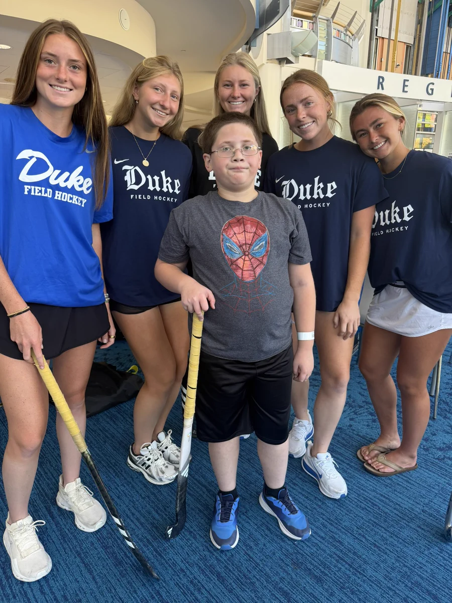 A group pic with some players at the Duke Children’s Hospital