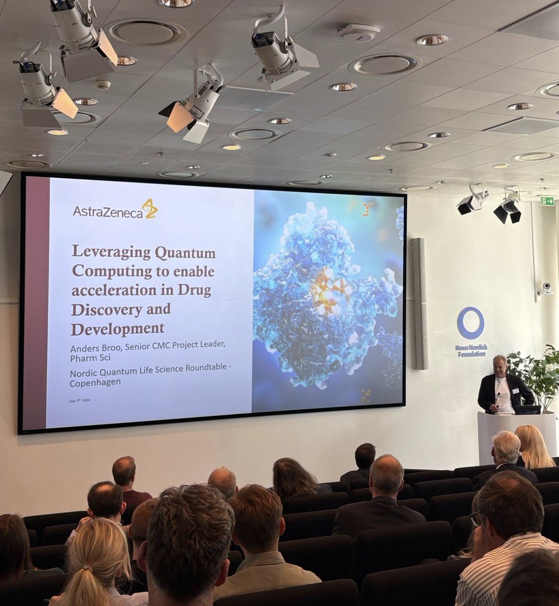 TechInnovationz's tweet photo. $IONQ AstraZeneca and IonQ presented at the Novo Nordisk Foundation.

The foundation controls Novo Nordisk, now branded Novo, through Novo Holdings, with about 28% of the shares and 77% of the votes at the end of 2025. On 4 September, the foundation said it has committed more than DKK 2.9 billion (€390 million) to quantum technology.

The Nordic Quantum Life Science Roundtable met there on September. Anders Broo, Senior CMC Project Leader in Pharmaceutical Sciences at AstraZeneca, presented the work his company did with IonQ, AWS and NVIDIA. Evgeny Epifanovsky, Director of Applications at IonQ, presented it too.

It models one step of a nickel-catalysed reaction used in drug development, on IonQ's Forte quantum computer and NVIDIA GPUs on AWS.

Physical Review Research published the paper on 15 July, after peer review. Broo is one of its authors.

Photos via Hannes Johansson, Regional Lead Nordics at IonQ.

$IONQ #IonQ #Quantum #LifeSciences