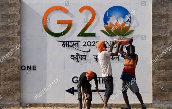 RShivshankar's tweet photo. BRICS 2026: LOOK AT THE PICTURE THEY CHOSE. THESE SAY A LOT ABOUT THE INDIA THEY CHOSE TO DEPICT. 
Across Western media coverage of the Delhi summit ONE striking visual depiction is dominating from NYT to DW to F24 to Al Jazeera among others. All pictures captured ordinary cyclists, mopeds and street-level scenes placed against BRICS banners and Modi posters. The visual emphasis is on the visibly less-developed side of India. Nothing wrong in depicting poverty framed against grand ambition. But don't pretend the depictions aren't suggestive of a pre-prescibed editorial slant.