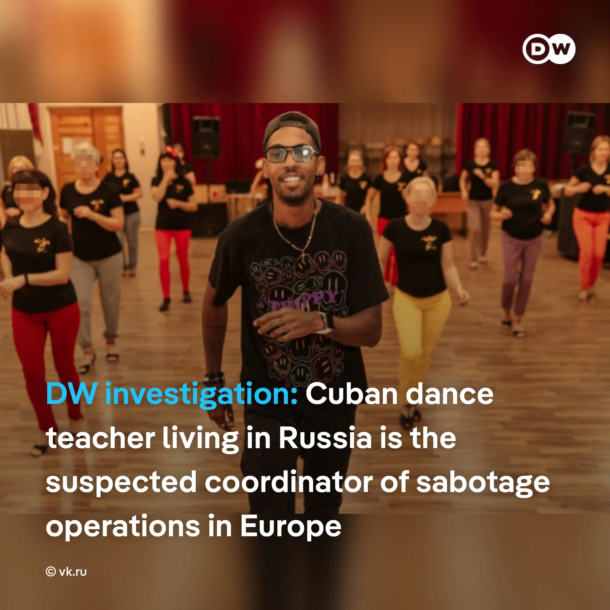 Promotional image for a DW investigation featuring a dance class in a hall, with a person leading participants in the foreground. On-screen text references an investigation into a Cuban dance teacher living in Russia and alleged links to sabotage operations in Europe.