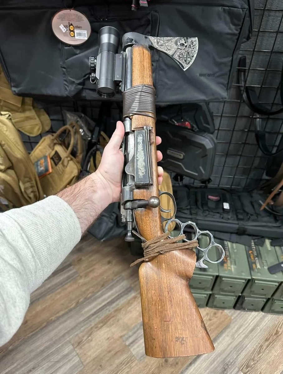gunfanatics1's tweet photo. When your gunsmith unlocks every single attachment in the loadout editor and decides to equip ALL of them at once. Scope for range, hatchet for close quarters, brass knuckles just in case things get personal. 💀

Honestly, I don’t know whether to aim it, chop firewood with it, or throw hands. Peak video game logic right here.