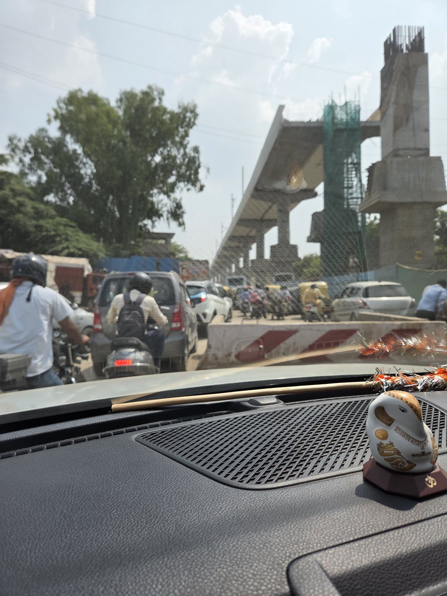 ShubhamS2616's tweet photo. The condition of the Khanpur–Mehrauli–Badarpur Road is pathetic. Stones have been placed right in the middle of the road, creating a serious safety hazard. Metro work has been going on for nearly four years and is still not complete, while traffic congestion remains a daily nightmare.

When the CM visits, the entire traffic route suddenly gets cleared—so why can’t the same effort be made for ordinary citizens? Are middle-class people supposed to suffer like this every day?

Is the Delhi Government sleeping? Is there any authority that actually listens to citizens’ complaints and takes action? @p_sahibsingh @LtGovDelhi @DelhiPwd @dtptraffic