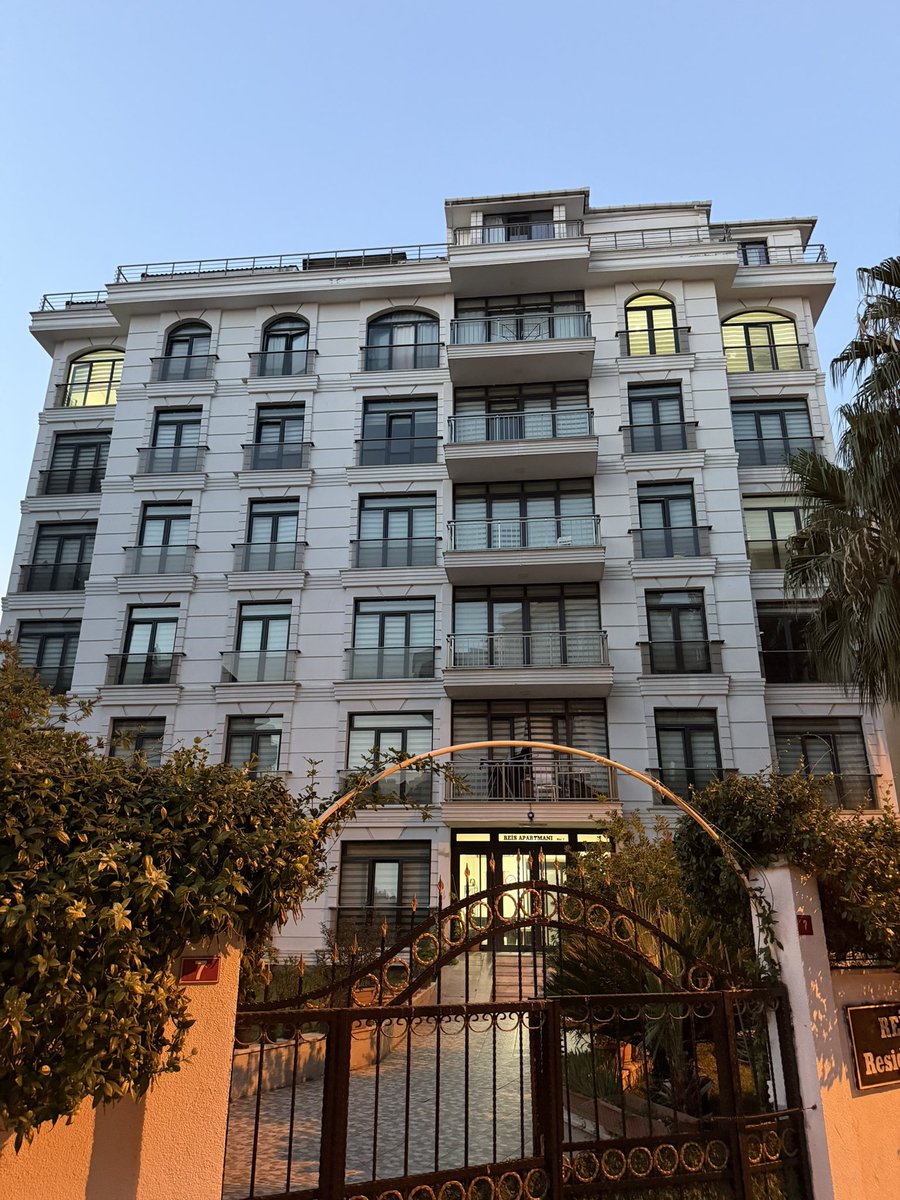 mustapha_dodo's tweet photo. Six years.

That is all it took.

Six years after leaving Istanbul, I returned to the neighbourhood where I once spent one of the most defining chapters of my life — Orhantepe Mahallesi, Kartal, Cevizli.

I still remember how alive this place used to be. Students everywhere. Familiar faces on every street. People I knew, people who knew me, the little places we used to eat, shop and spend our time. This was once a place where I felt completely at home.

But when I returned, everything felt different.

The streets were almost completely empty. The university had changed. The people I knew were gone. Even when I went to the university, I was stopped at the gate and told that I could not enter because I was now a visitor. I had to come back on Monday to receive a visitor’s card.

And somehow, that moment affected me more than I expected.

I stood there thinking: How can I be a visitor here?

This was once a place where I lived, studied, built friendships and made memories. There was a time when I could walk through those gates without anyone questioning who I was. Yet six years later, I was standing outside like a complete stranger.

Then something even more beautiful happened.

The friend who took me around the neighbourhood had arrived there only a few months before I left. Back then, he was the stranger. I was the one showing him around. I knew the streets, the shortcuts, the shops and the places he had never seen.

Six years later, the roles had completely reversed.

He was the one who knew the neighbourhood. He was the one showing me around. I was the stranger.

I don’t know if there is a better metaphor for the temporary nature of this dunya.

Allah says:

﴿وَمَا الْحَيَاةُ الدُّنْيَا إِلَّا مَتَاعُ الْغُرُورِ﴾

“And the life of this world is nothing but an enjoyment of delusion.”
— Qur’an 3:185

We spend so much of our lives building things as though we will remain here forever. Houses. Businesses. Cars. Money. Status. Recognition. We exhaust ourselves trying to become somebody in a world that eventually forgets every one of us.

And yet, all it takes is a few years away for a place that once felt like ours to become unfamiliar.

Imagine what happens after fifty years.

A hundred years.

After we are buried and generations that never knew us walk through the places where we once lived.

Someone else will sleep in our rooms. Someone else will drive our cars. Someone else will own the businesses we built. Someone else will walk through the streets where our footsteps once were.

And eventually, even our names will become unfamiliar to most people.

The neighbourhood will continue.

The streets will continue.

The world will continue.

Just without us.

That thought humbled me deeply.

Perhaps this is why Allah repeatedly reminds us not to become deceived by the dunya. We are not here to possess it permanently. We are only passing through it.

So what is actually worth spending our lives chasing?

Our relationship with Allah.

Our prayers.

Our character.

The people we treated well.

The kindness we left behind.

The good we did when nobody was watching.

The legacy of faith and goodness we leave in the hearts of people who knew us.

Everything else eventually becomes someone else’s.

I returned to Istanbul expecting nostalgia.

I left with a reminder.

Six years was enough to make me a stranger in a place where I once felt completely at home.

One day, this entire dunya will be the same.

We will leave it behind, and life will continue without us.

May Allah make us among those who understand this before it is too late, and may He give us the wisdom to invest in what remains when everything else is gone.

فَفِرُّوا إِلَى اللَّهِ

“So flee to Allah.”
— Qur’an 51:50
Cc @Supheey @emran_dodo @Nigeria_First_