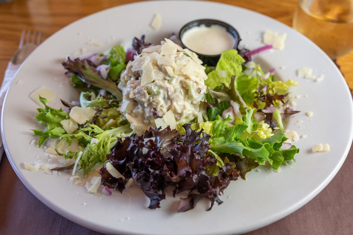 ReillysPubGL's tweet photo. Almond &amp; Cranberry Chicken Salad is one of the most-ordered picks at Reilly's Pub 🥗 Chicken salad mixed with almonds and cranberries, romaine lettuce, shaved parmesan blend, red onions, and a side of ranch keeps guests coming back. #ReillysPub #ChickenSalad #PubFavorites https://t.co/OB3QqATRJn